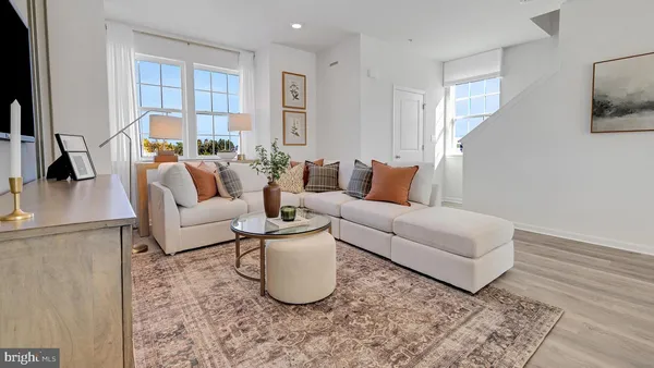 a living room with furniture and a couch