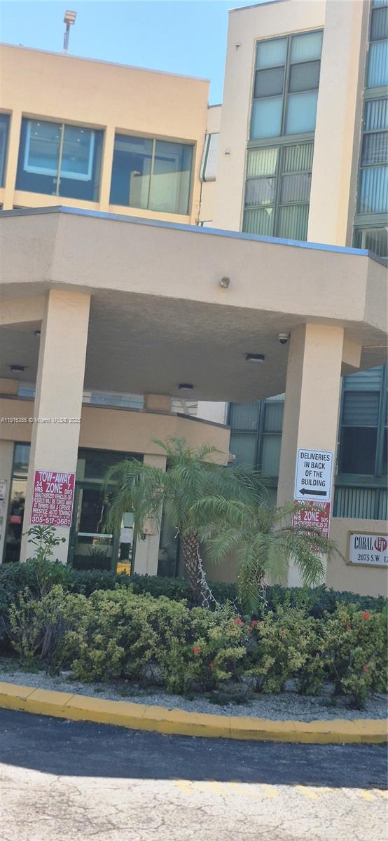 2075 Southwest 122nd Avenue, Unit 402 Miami, FL 33175 - Photo 12 of 36 a view of a building front