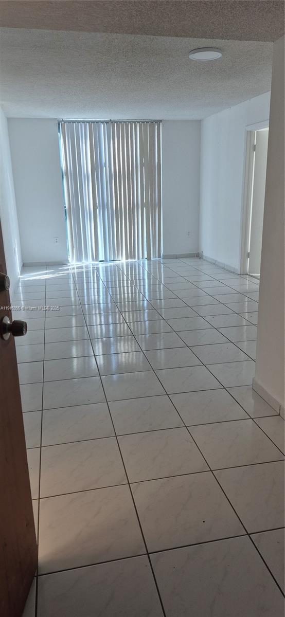 2075 Southwest 122nd Avenue, Unit 402 Miami, FL 33175 - Photo 24 of 36 a view of entryway with utility and racks