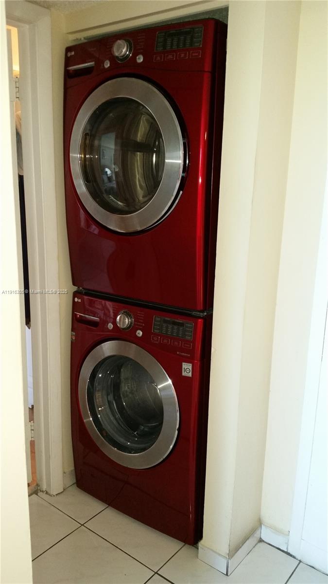 2075 Southwest 122nd Avenue, Unit 402 Miami, FL 33175 - Photo 27 of 36 a utility room with dryer and washer