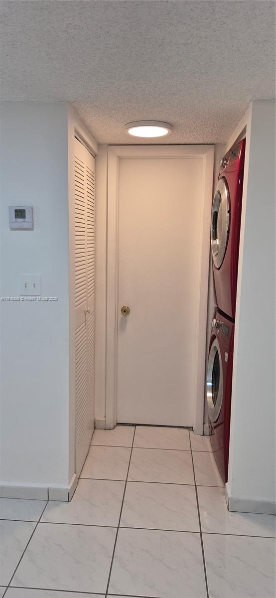 2075 Southwest 122nd Avenue, Unit 402 Miami, FL 33175 - Photo 29 of 36 a view of a storage & utility room with washer and dryer