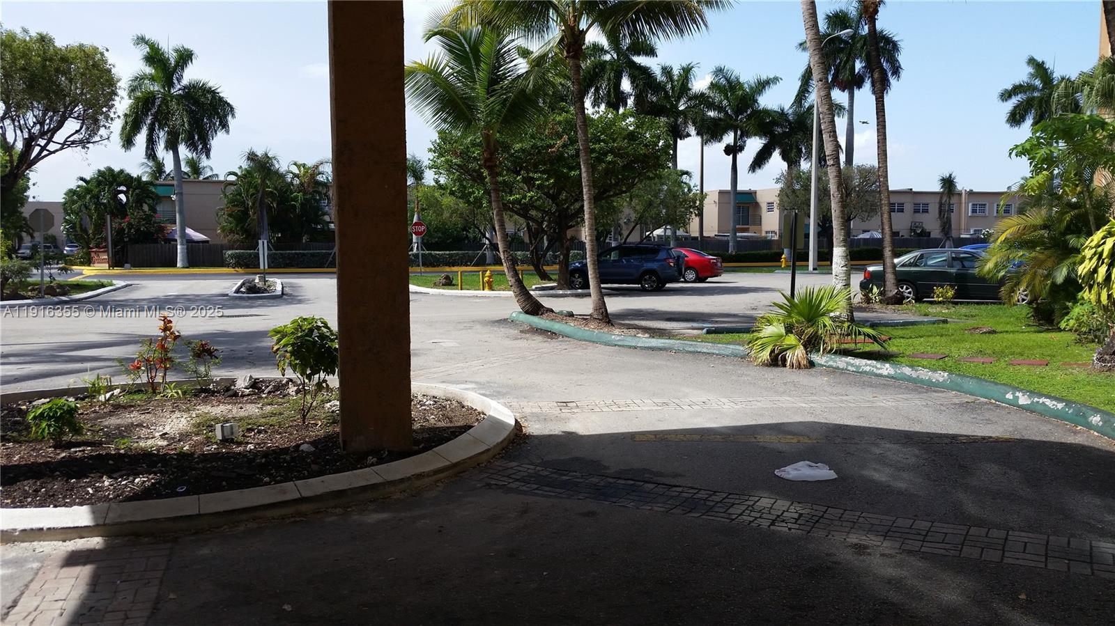 2075 Southwest 122nd Avenue, Unit 402 Miami, FL 33175 - Photo 5 of 36 a view of a swimming pool with a patio