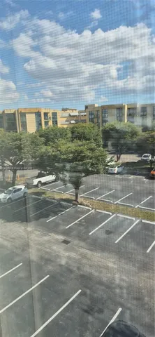 a view of water with a building in the background