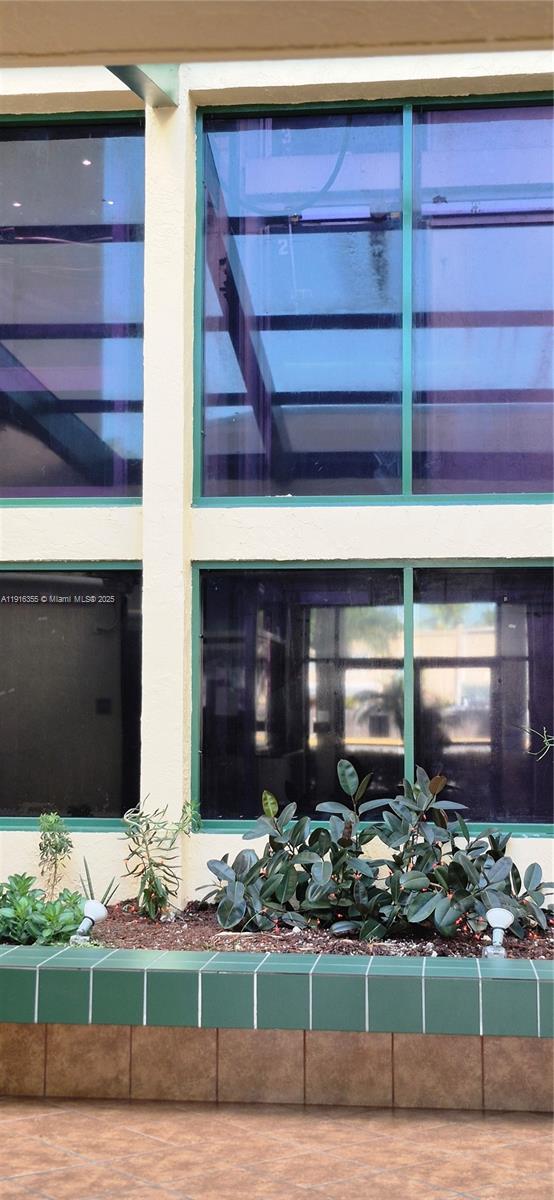 2075 Southwest 122nd Avenue, Unit 402 Miami, FL 33175 - Photo 10 of 36 a front view of a house