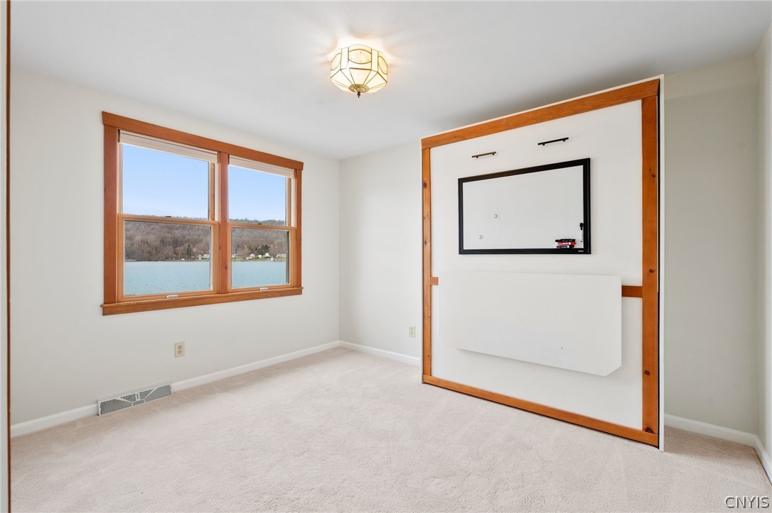 3275 Cemetery Road Marietta, NY 13110 - Photo 17 of 40 Bedroom with a Murphy Bed