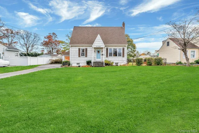 a view of a house with a big yard