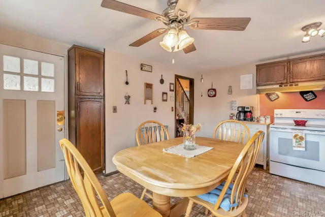 a view of a dining room with furniture