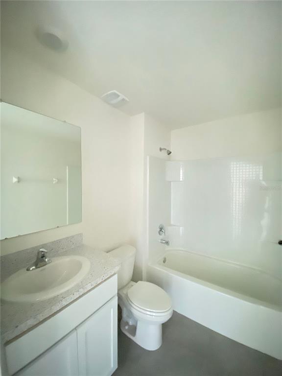 492 Hickory Course Loop Ocala, FL 34472 - Photo 16 of 28 a bathroom with a sink toilet vanity and shower