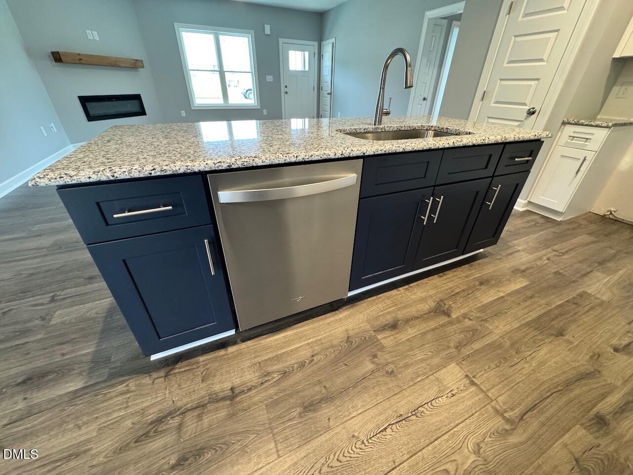 9 Alex Acres Way Selma, NC 27576 - Photo 11 of 26 a bathroom with a granite countertop sink a mirror and vanity