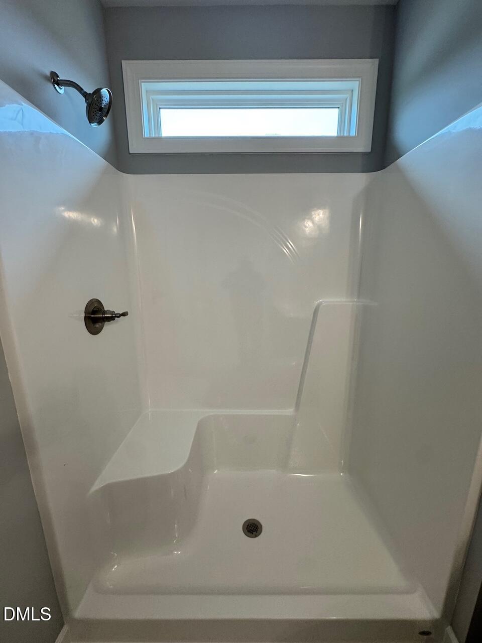 9 Alex Acres Way Selma, NC 27576 - Photo 16 of 26 a bathroom with a shower