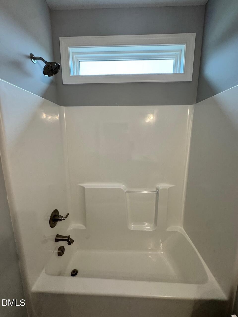 9 Alex Acres Way Selma, NC 27576 - Photo 24 of 26 a bathroom with a tub