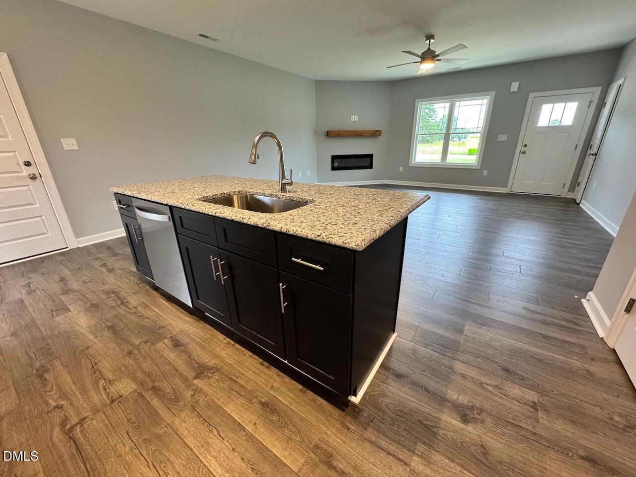 9 Alex Acres Way Selma, NC 27576 - Photo 10 of 26 a kitchen with sink and cabinets