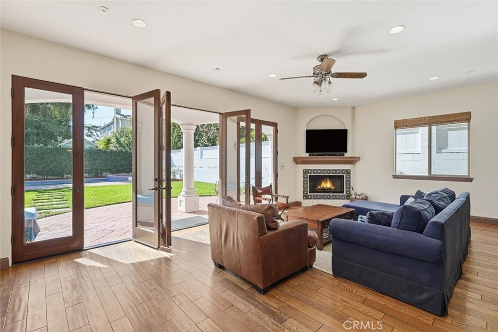 1740 Ruhland Avenue Manhattan Beach, CA 90266 - Photo 20 of 61 a living room with fireplace furniture and a large window
