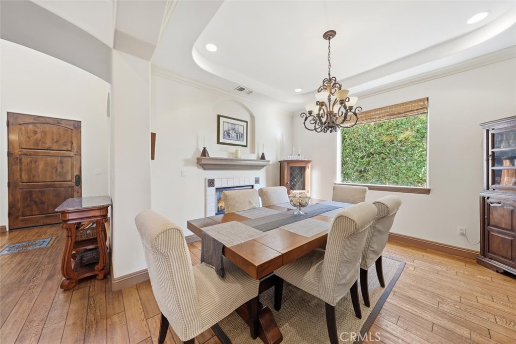 1740 Ruhland Avenue Manhattan Beach, CA 90266 - Photo 29 of 61 a view of a dining room with furniture a chandelier and wooden floor