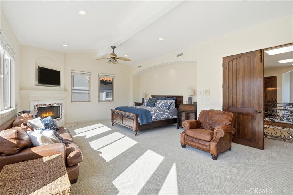1740 Ruhland Avenue Manhattan Beach, CA 90266 - Photo 34 of 61 a living room with furniture and a fireplace