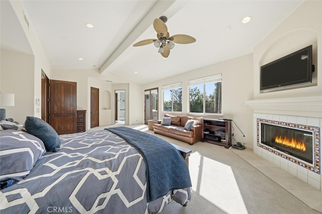 1740 Ruhland Avenue Manhattan Beach, CA 90266 - Photo 36 of 61 a spacious bedroom with a bed and a flat screen tv