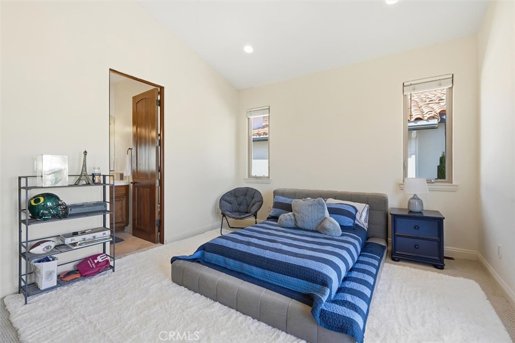 1740 Ruhland Avenue Manhattan Beach, CA 90266 - Photo 43 of 61 a bedroom with furniture and a potted plants