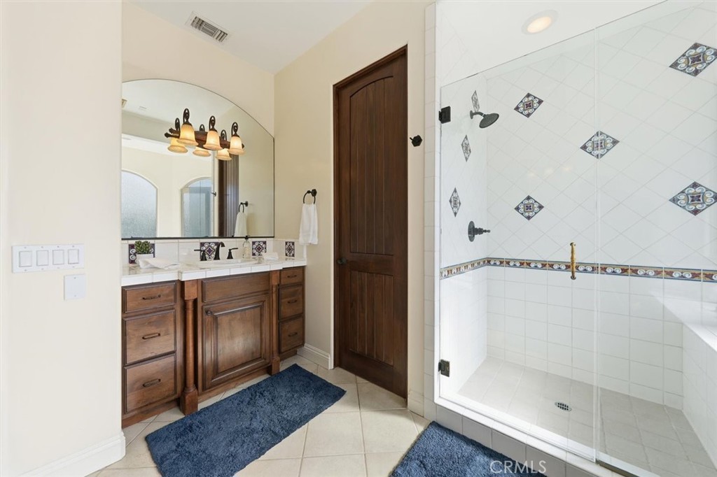 1740 Ruhland Avenue Manhattan Beach, CA 90266 - Photo 48 of 61 a bathroom with a double vanity sink mirror and shower