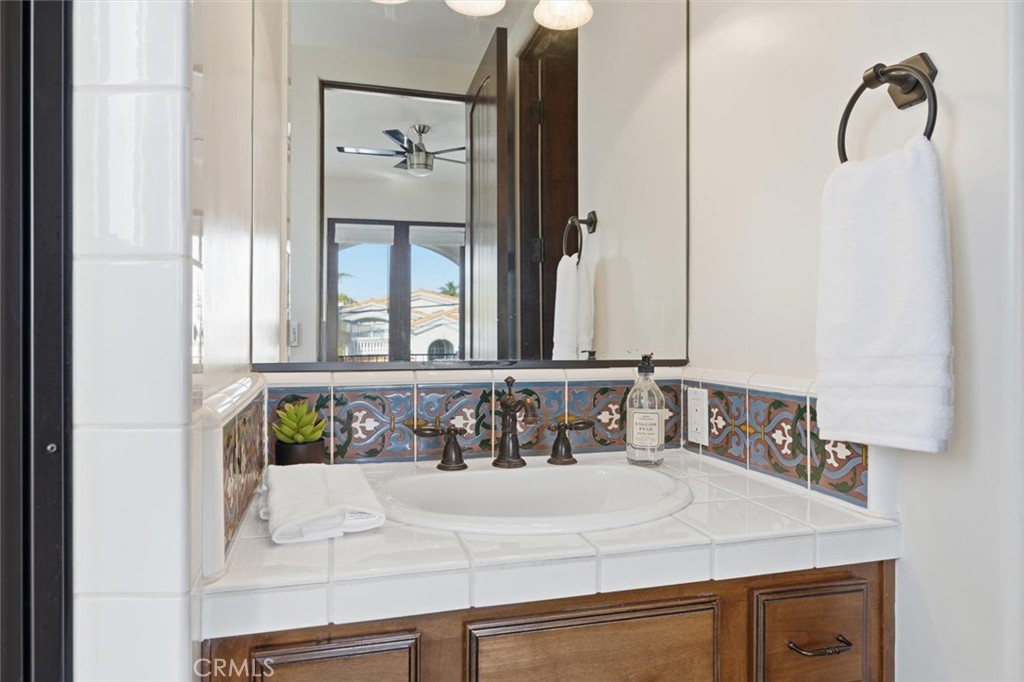 1740 Ruhland Avenue Manhattan Beach, CA 90266 - Photo 53 of 61 a bathroom with a sink and a mirror