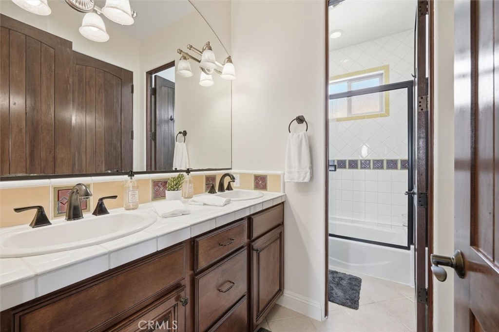 1740 Ruhland Avenue Manhattan Beach, CA 90266 - Photo 54 of 61 a bathroom with a double vanity sink mirror and double