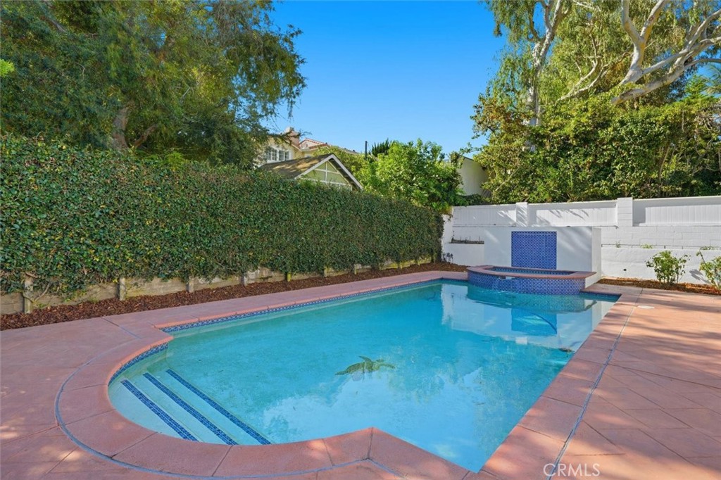 1740 Ruhland Avenue Manhattan Beach, CA 90266 - Photo 57 of 61 a view of a swimming pool with a yard