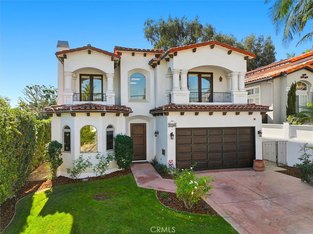 1740 Ruhland Avenue Manhattan Beach, CA 90266 - Photo 6 of 61 front view of a house with a yard