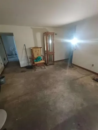 a kitchen with sink and cabinets
