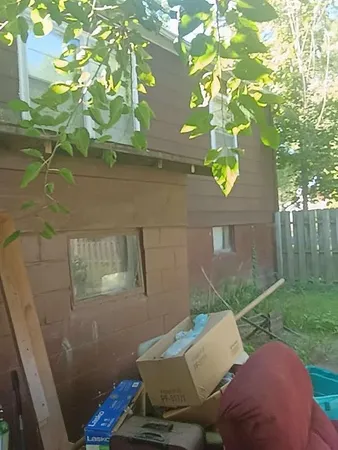 a view of backyard with green space