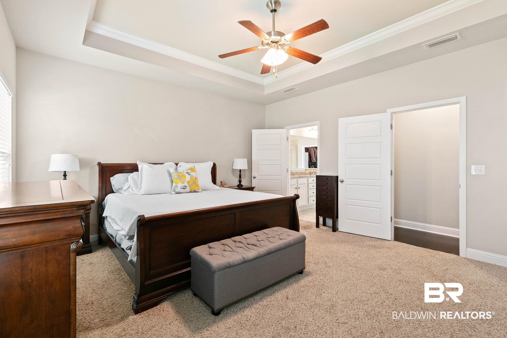 12750 B Jenkins Pit Road Daphne, AL 36527 - Photo 32 of 89 Carpeted bedroom with ornamental molding, ceiling fan, ensuite bathroom, and a tray ceiling