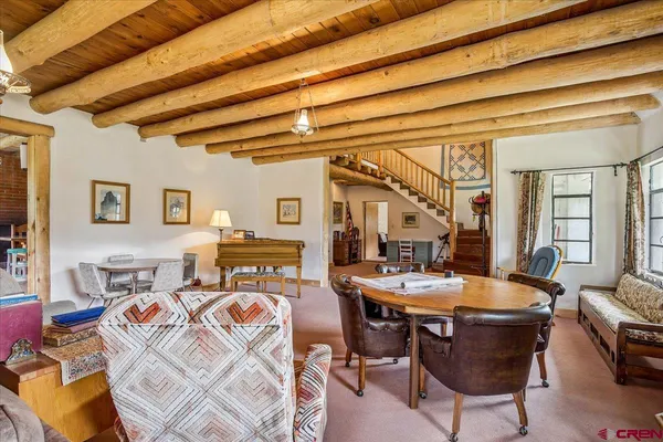 a living room with a couch and a table