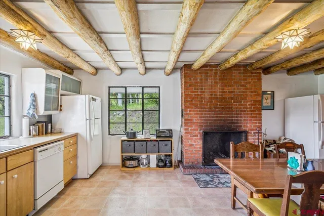 a living room with furniture oven and a fireplace