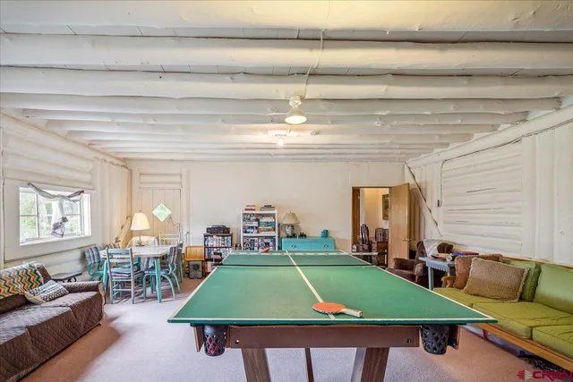 a room with furniture and a chandelier