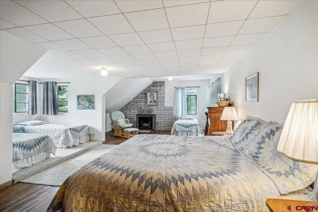 a bed room with a bed and a couch