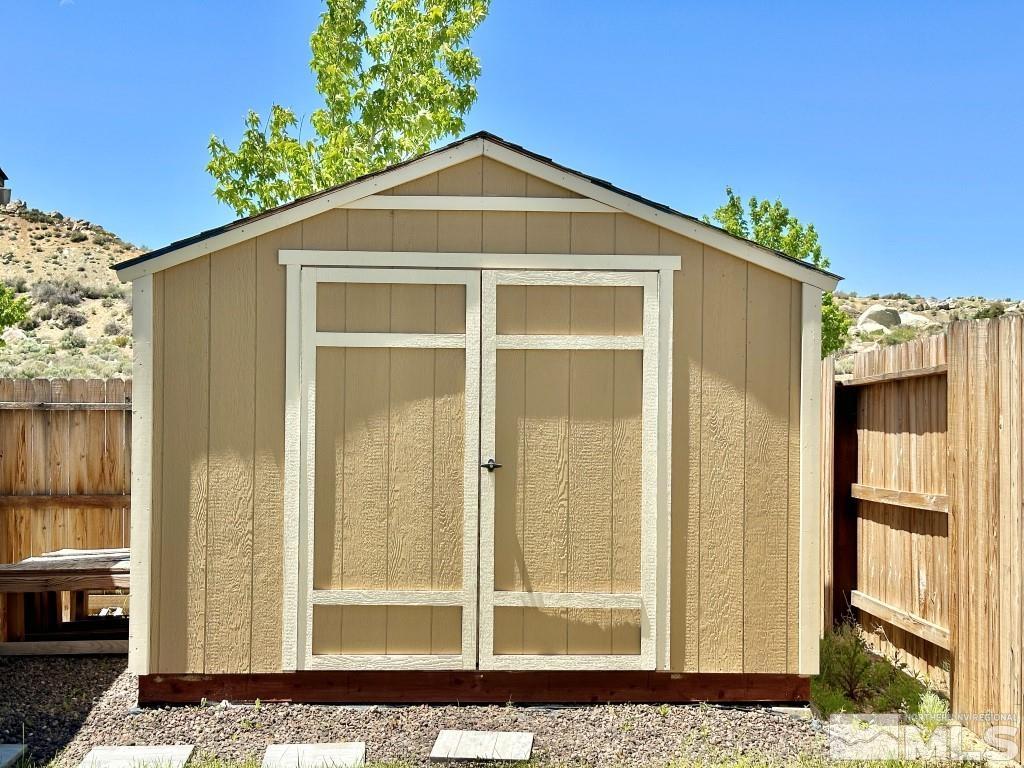 343 Double Spring Drive Reno, NV 89506 - Photo 26 of 27 a front view of a house with a yard