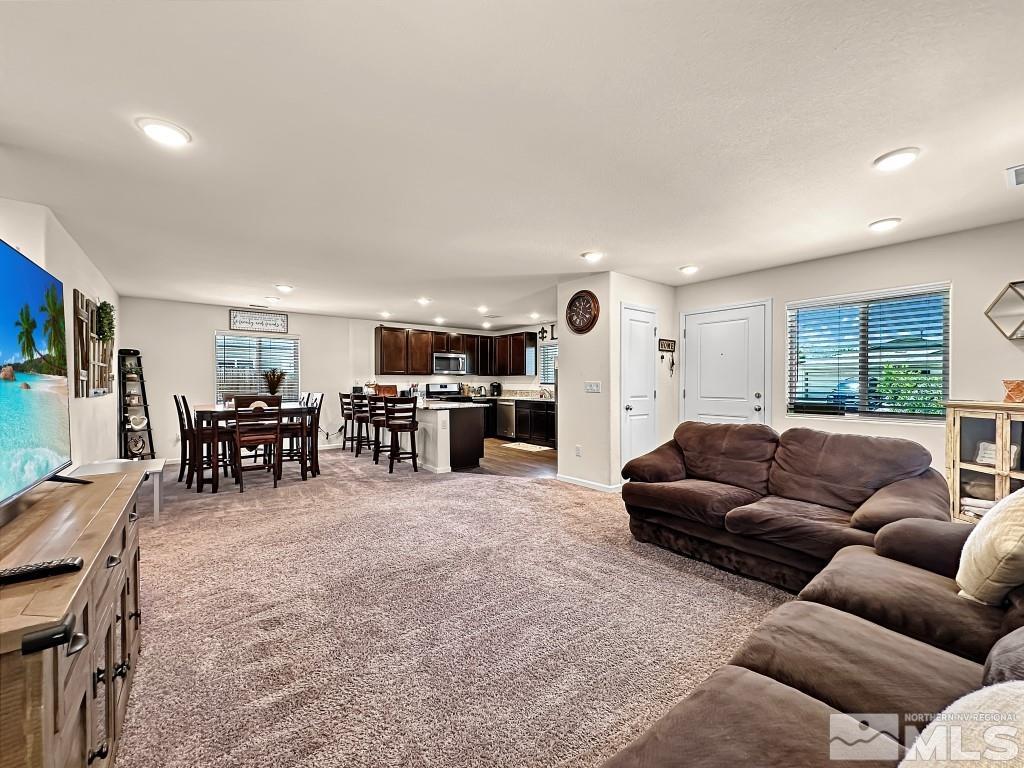 343 Double Spring Drive Reno, NV 89506 - Photo 4 of 27 a living room with furniture and kitchen view