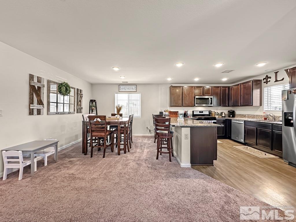 343 Double Spring Drive Reno, NV 89506 - Photo 10 of 27 a kitchen with lots of counter top space