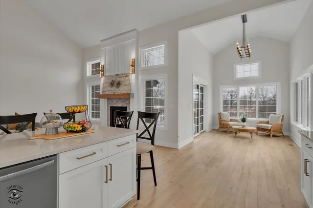 a view of a livingroom with furniture and a fireplace