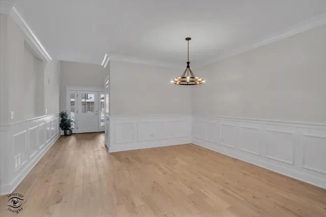 a view of empty room with windows