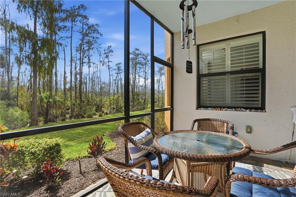 9715 Acqua Court, Unit 113 Naples, FL 34113 - Photo 23 of 31 View of sunroom / solarium