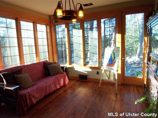428 North Riverside Road Highland, NY 12528 - Photo 11 of 17 a living room with furniture and a large window