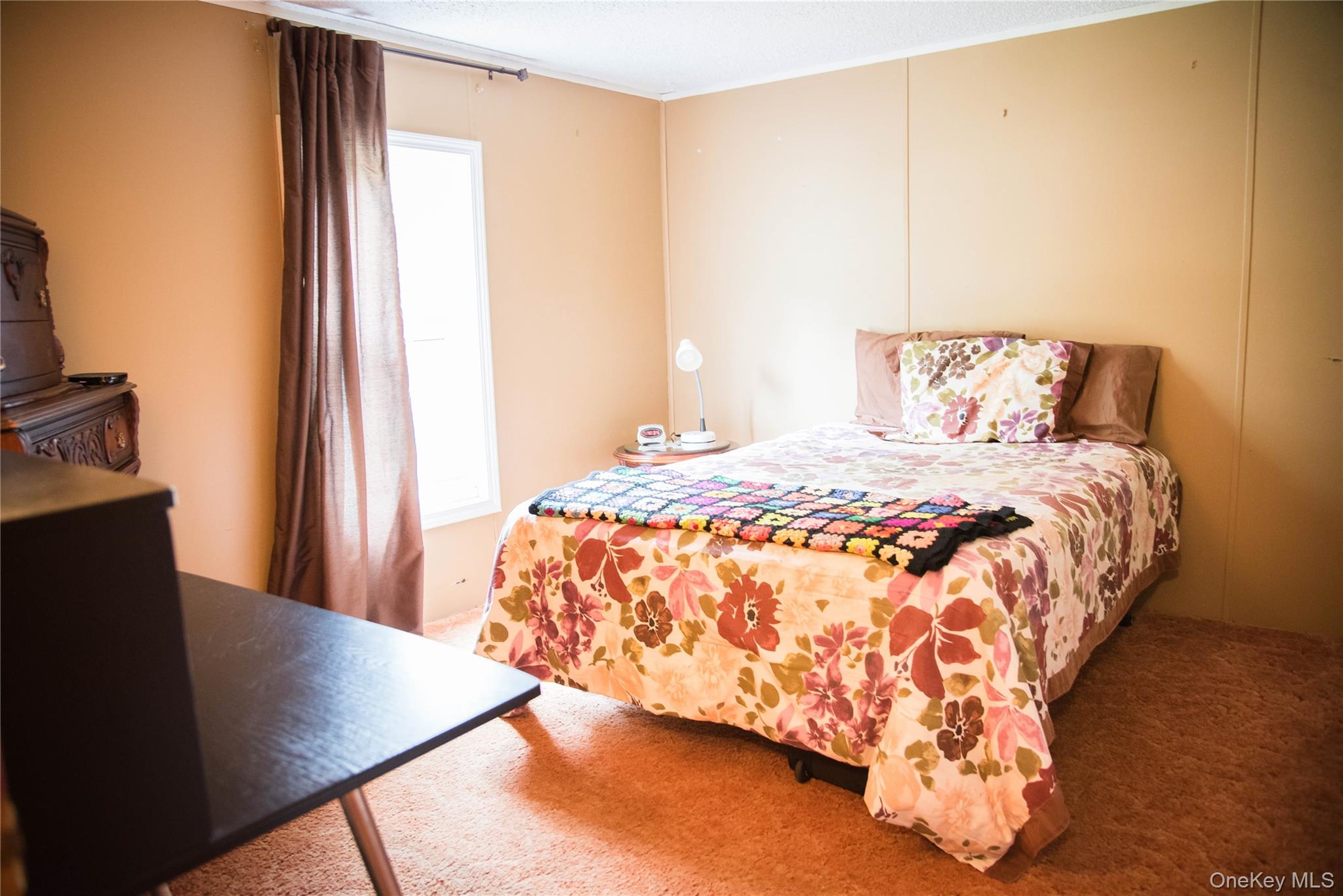 502 Myers Road Neversink, NY 12765 - Photo 30 of 38 a bedroom with a bed and a window