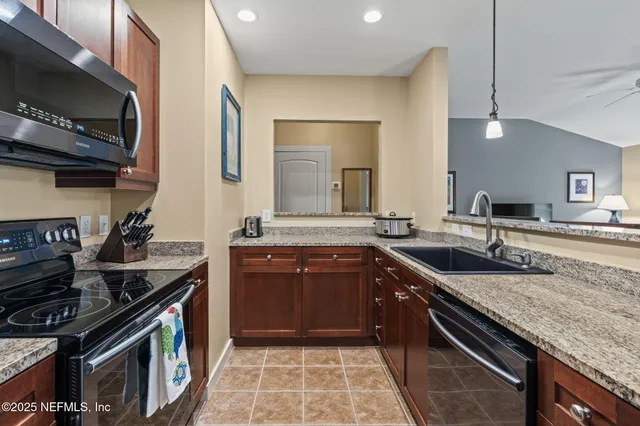 a view of a house with swimming pool and a sitting area