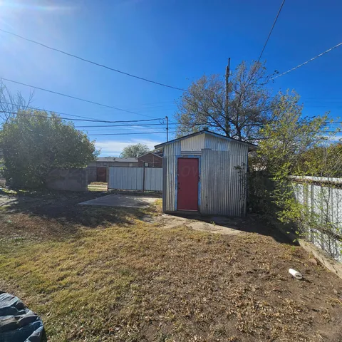 a house view with a backyard space
