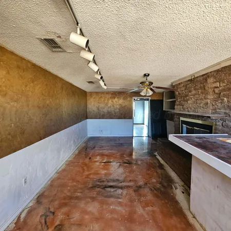 a view of a livingroom with a fireplace