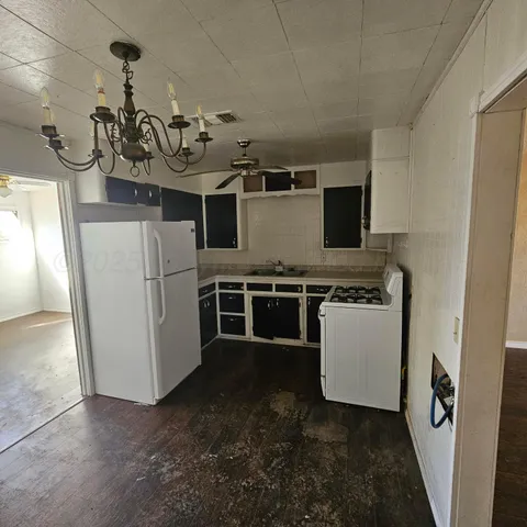 a view of a storage & utility room with washer and dryer