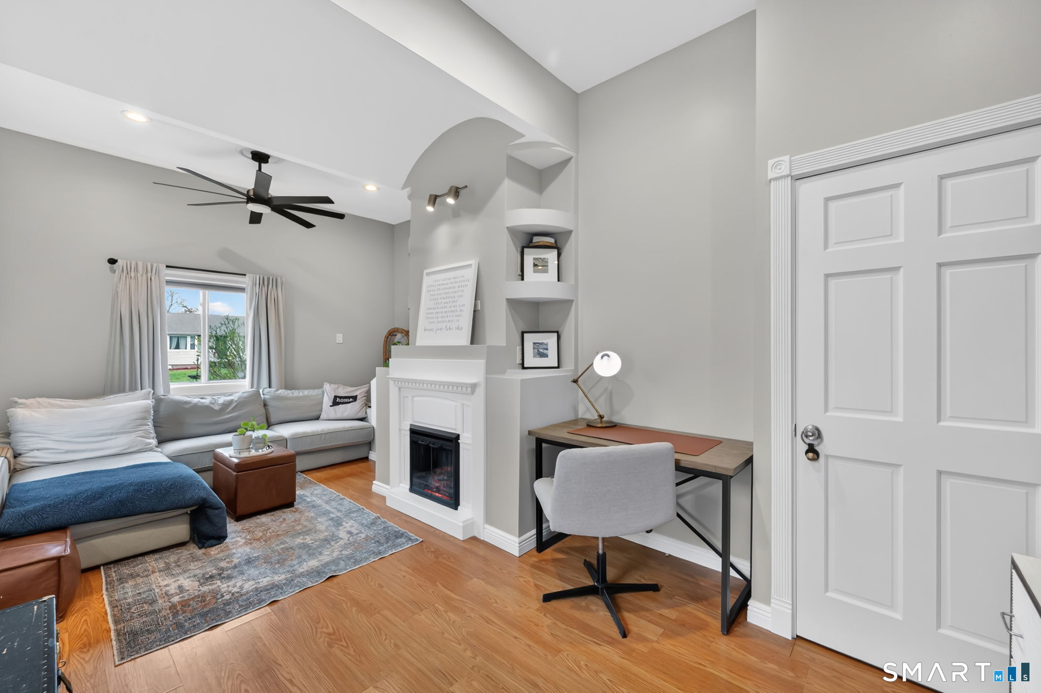 77 Berkeley Road Middletown, CT 06457 - Photo 23 of 29 Sunken Family room with electric fireplace and soaring ceilings
