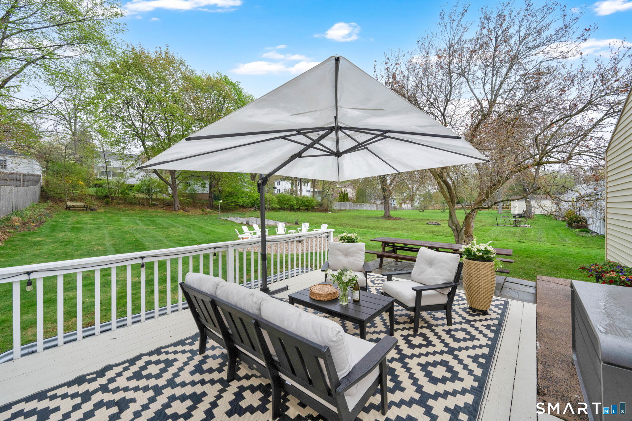 77 Berkeley Road Middletown, CT 06457 - Photo 5 of 29 Deck to level yard, fire ring and garden