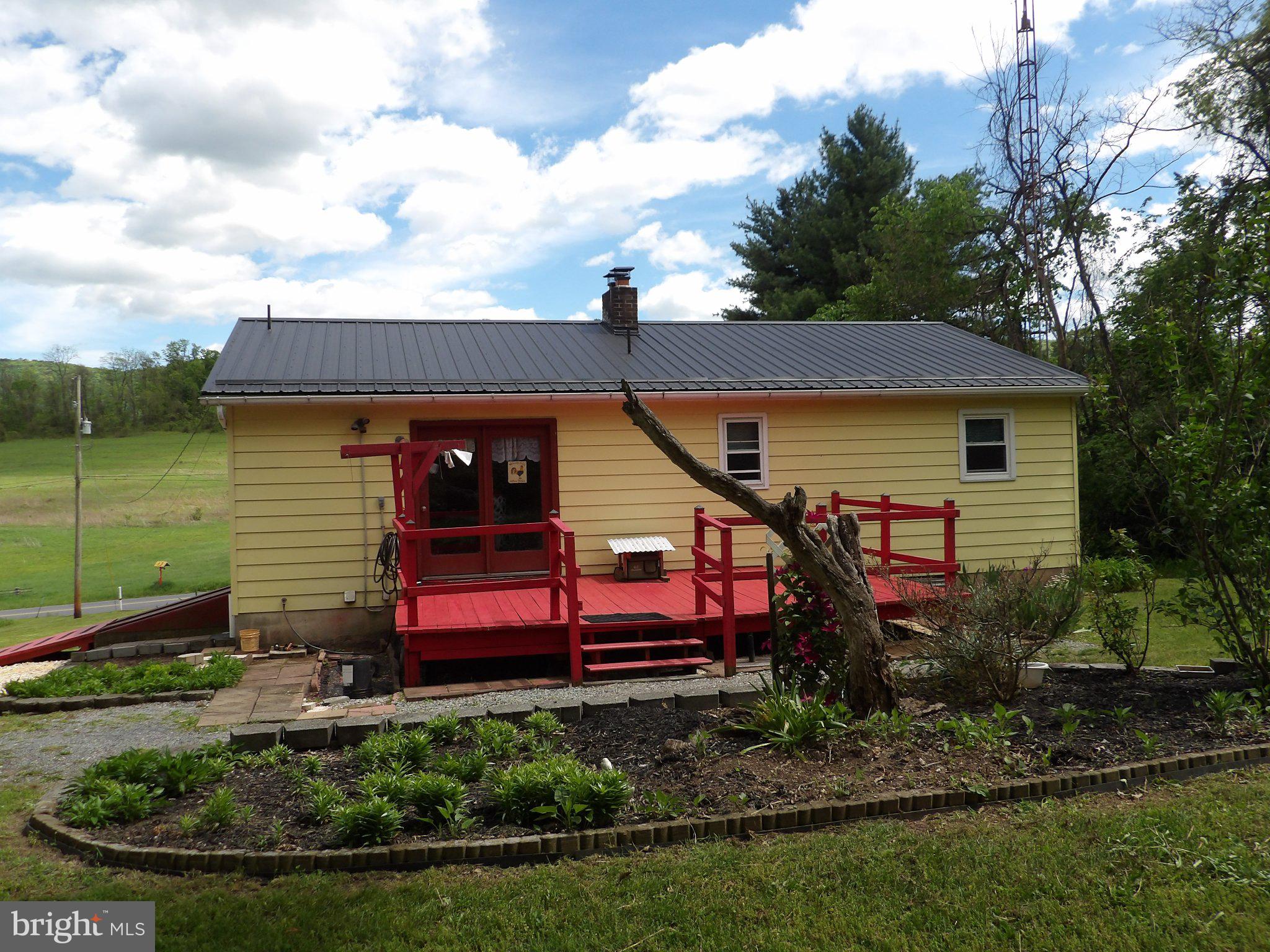 1045 Lockport Road Lewistown, PA 17044 - Photo 24 of 51 Charming yellow cottage with red accents.