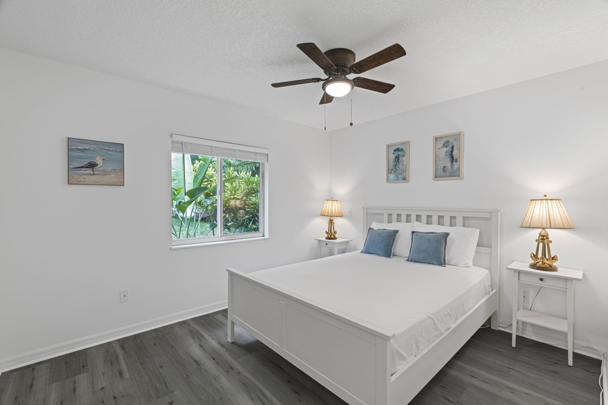 110 Dory Road St. Augustine, FL 32086 - Photo 23 of 35 a large white bed in a white room