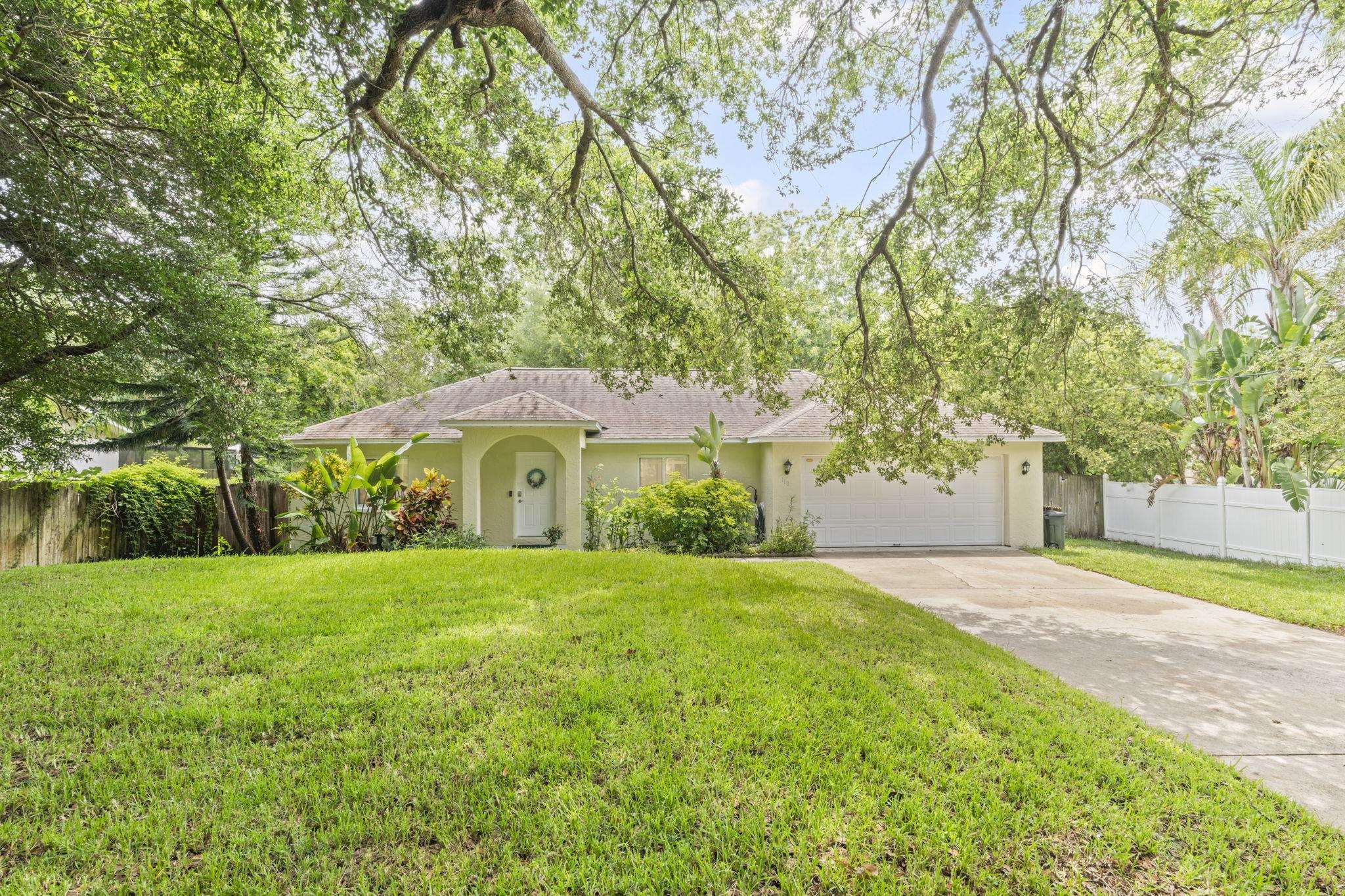 110 Dory Road St. Augustine, FL 32086 - Photo 35 of 35 a front view of a house with yard and green space
